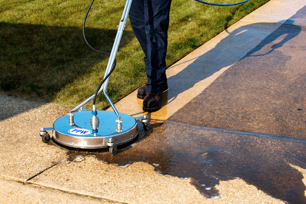 Power Washing a Concrete Surface