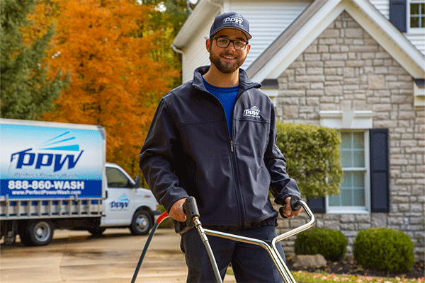 Smiling Perfect Power Wash employee